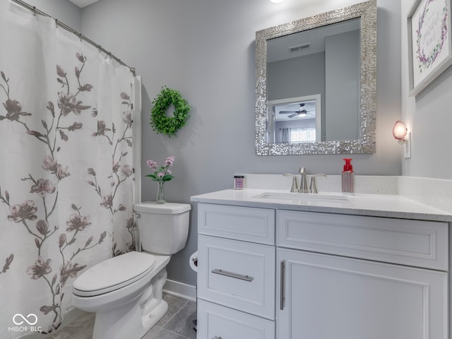 3697 Chalmers Dr, Bargersville, IN 46106 - bathroom featuring vanity, toilet, tile patterned flooring, ceiling fan, and baseboards