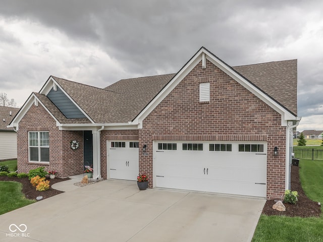 3697 Chalmers Dr, Bargersville, IN 46106 - view of front of house with roof with shingles, brick siding, and a garage