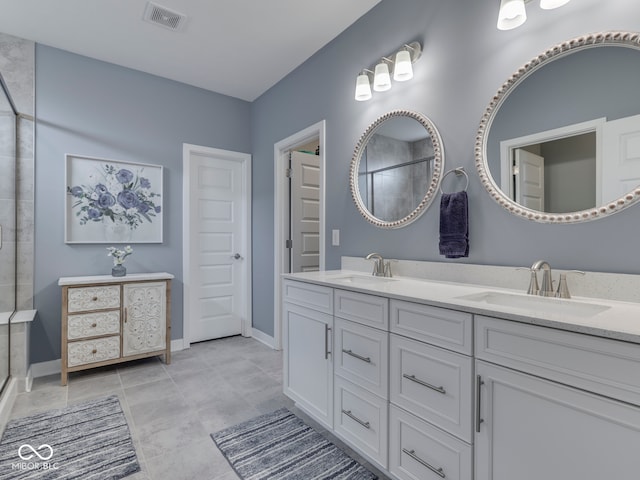 3697 Chalmers Dr, Bargersville, IN 46106 - full bathroom with a tile shower, double vanity, and baseboards