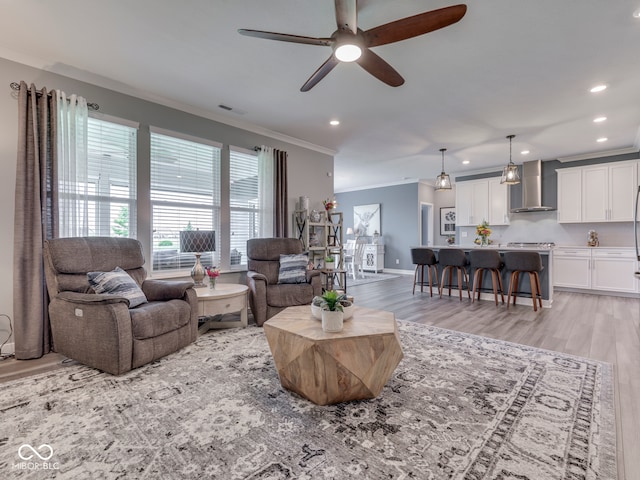3697 Chalmers Dr, Bargersville, IN 46106 - living room with crown molding, a ceiling fan, light wood-style floors, recessed lighting, and baseboards