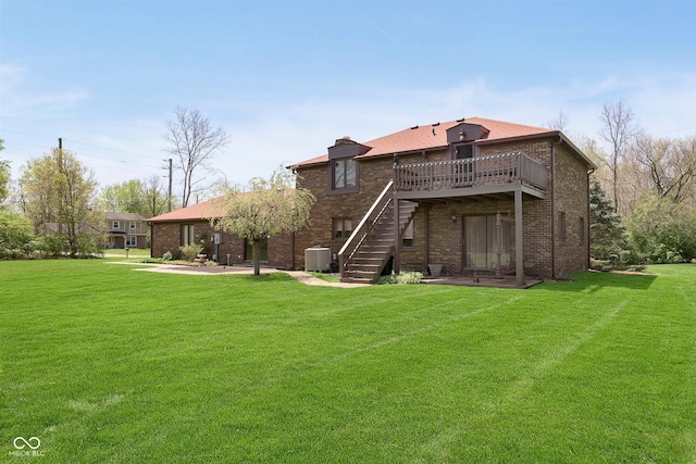 7901 Oaklandon Rd, Indianapolis, IN 46236 - back of property with stairs, a deck, central AC unit, a patio area, and a lawn