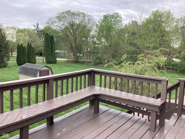 7901 Oaklandon Rd, Indianapolis, IN 46236 - wooden deck featuring an outbuilding, a yard, and a storage shed
