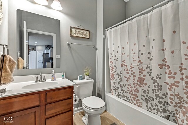 4809 Ozark Ln, Indianapolis, IN 46239 - bathroom with toilet, vanity, tile patterned flooring, and shower / tub combo with curtain