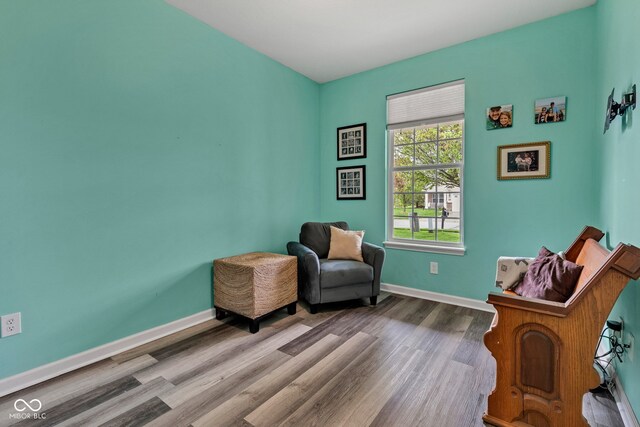4809 Ozark Ln, Indianapolis, IN 46239 - sitting room with baseboards and wood finished floors