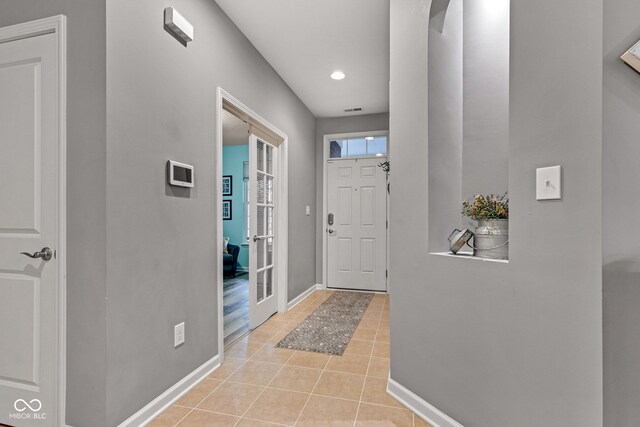 4809 Ozark Ln, Indianapolis, IN 46239 - entrance foyer with baseboards, recessed lighting, and light tile patterned floors