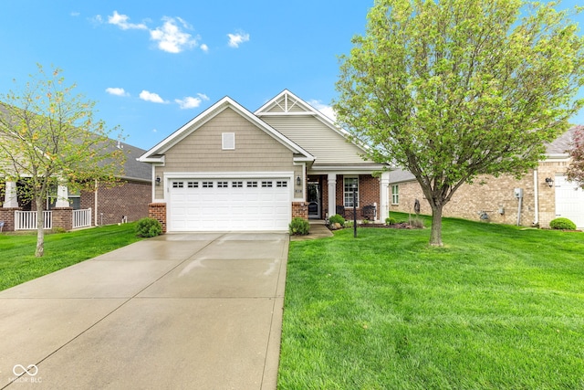 4809 Ozark Ln, Indianapolis, IN 46239 - craftsman-style house with brick siding, a front yard, concrete driveway, and an attached garage