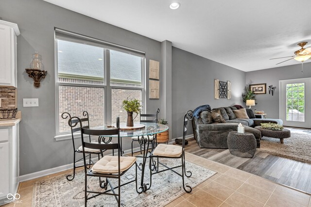 4809 Ozark Ln, Indianapolis, IN 46239 - dining space with light tile patterned floors, recessed lighting, ceiling fan, and baseboards