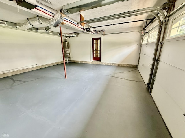 garage featuring water heater