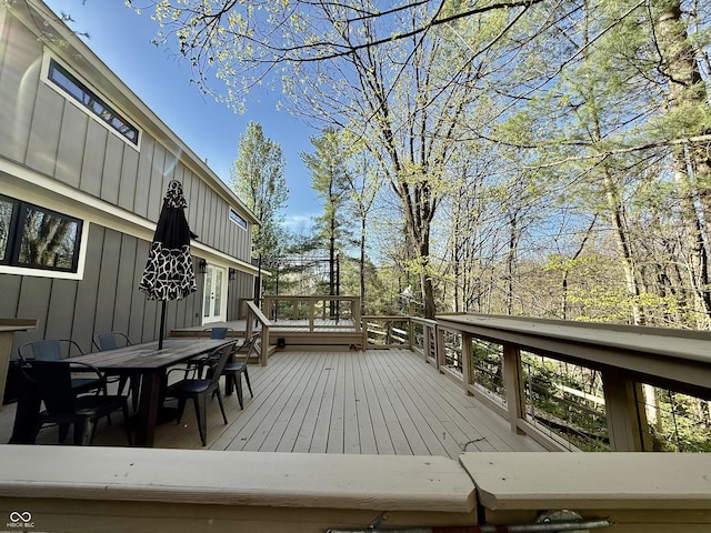 deck featuring outdoor dining space