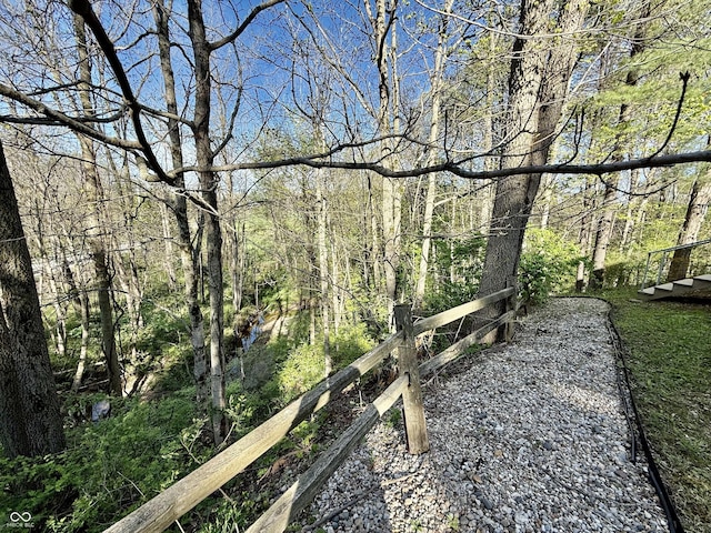 exterior space with a view of trees