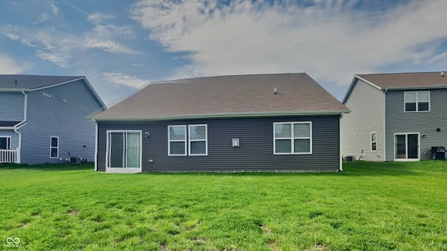 6118 Aspen Meadow Dr, Indianapolis, IN 46237 - rear view of property with central AC unit and a yard