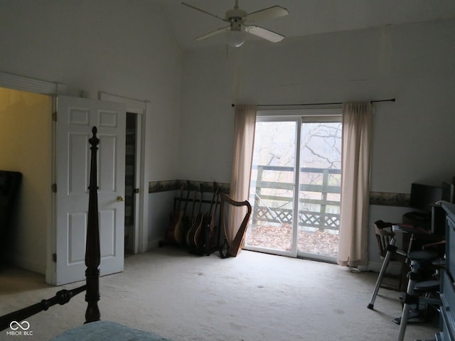 carpeted bedroom with a ceiling fan, multiple windows, and high vaulted ceiling