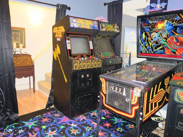 recreation room featuring wood finished floors