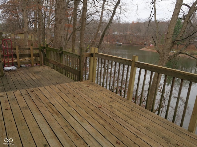 deck featuring a water view