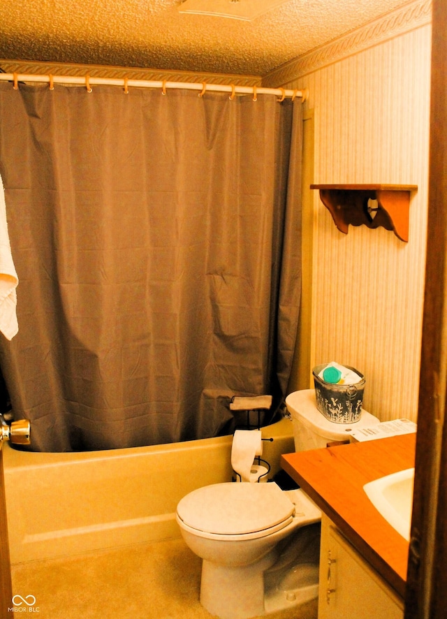 bathroom with vanity, toilet, and shower / tub combo