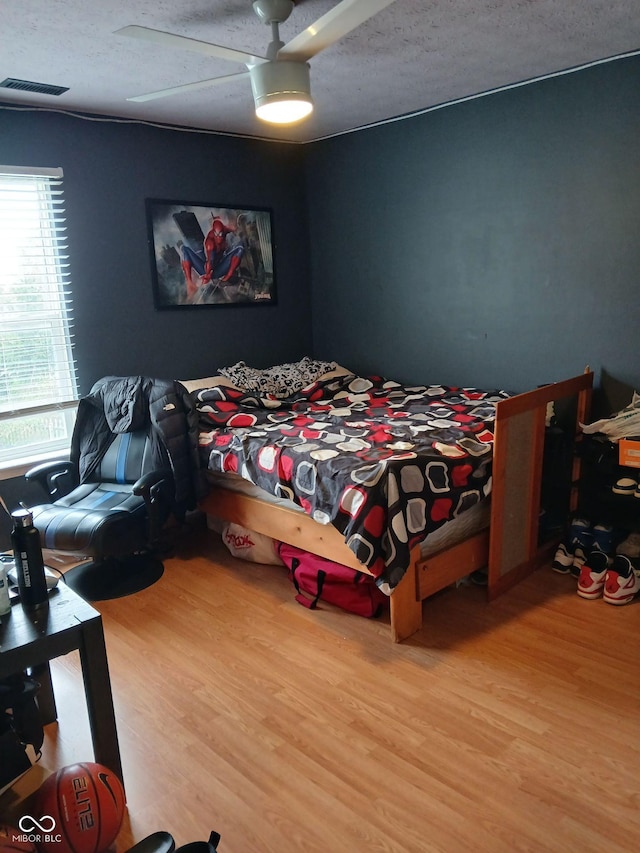 11651 Congressional Ln, Indianapolis, IN 46235 - bedroom featuring visible vents, ceiling fan, and wood finished floors