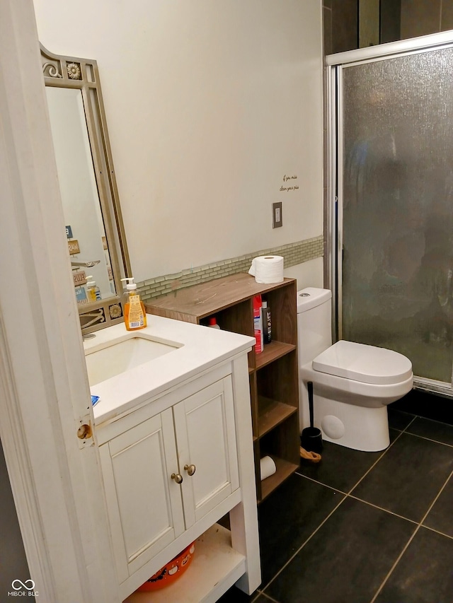 11651 Congressional Ln, Indianapolis, IN 46235 - bathroom with toilet, vanity, a shower stall, and tile patterned flooring