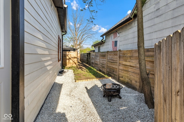257 N Tacoma Ave, Indianapolis, IN 46201 - view of yard featuring a fire pit and fence