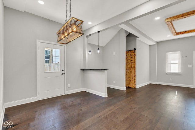 257 N Tacoma Ave, Indianapolis, IN 46201 - foyer featuring baseboards, lofted ceiling, recessed lighting, and dark wood-type flooring
