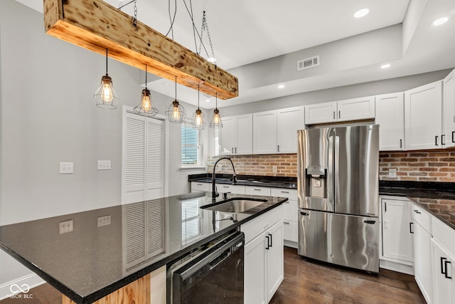 257 N Tacoma Ave, Indianapolis, IN 46201 - kitchen featuring a sink, black dishwasher, stainless steel refrigerator with ice dispenser, visible vents, and recessed lighting