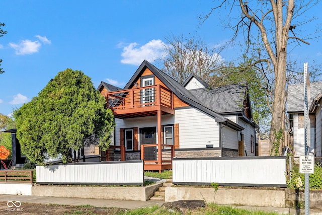257 N Tacoma Ave, Indianapolis, IN 46201 - back of property featuring a balcony and fence