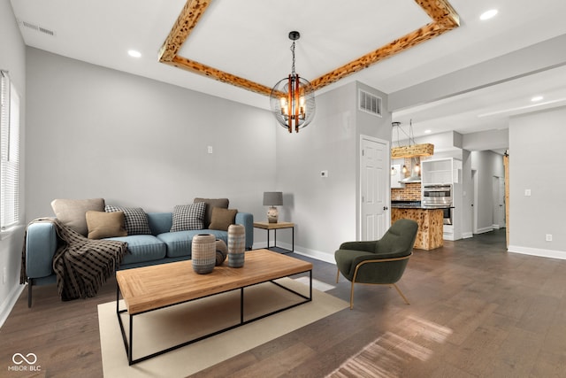 257 N Tacoma Ave, Indianapolis, IN 46201 - living room featuring dark wood finished floors, baseboards, visible vents, and recessed lighting