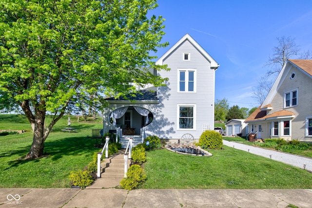 view of front of home featuring a front lawn