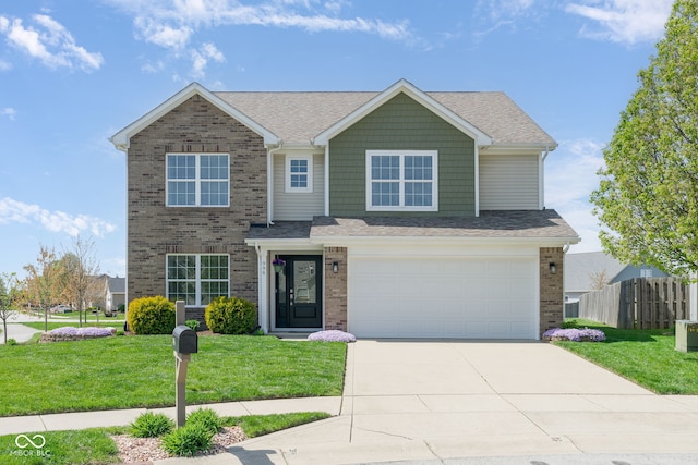996 Denton Ct, Westfield, IN 46074 - view of front of property featuring a garage, brick siding, fence, a front lawn, and concrete driveway
