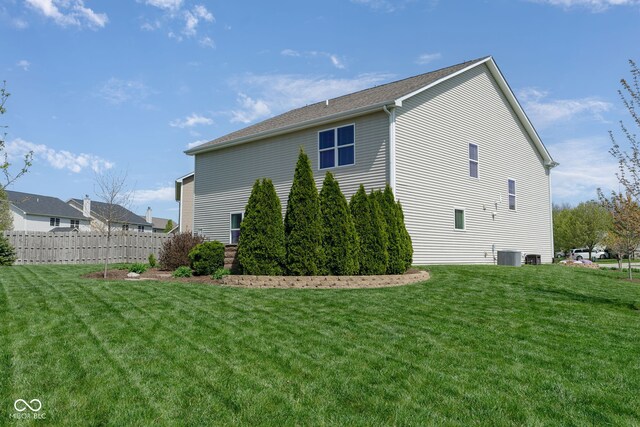 996 Denton Ct, Westfield, IN 46074 - view of property exterior featuring a lawn, fence, and central air condition unit