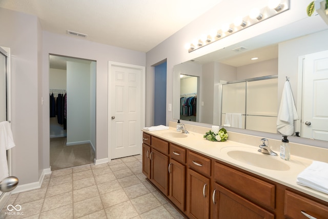 996 Denton Ct, Westfield, IN 46074 - full bath with a sink, baseboards, a shower stall, and visible vents