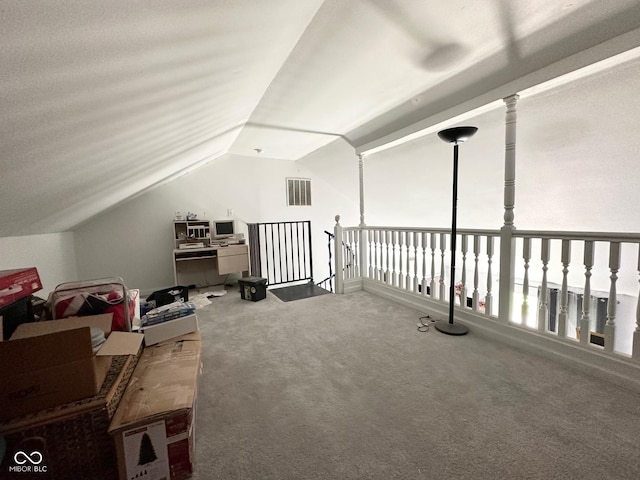 bonus room with visible vents, carpet floors, and vaulted ceiling