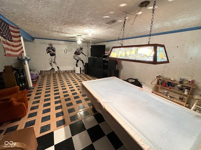 interior space with visible vents and tile patterned floors