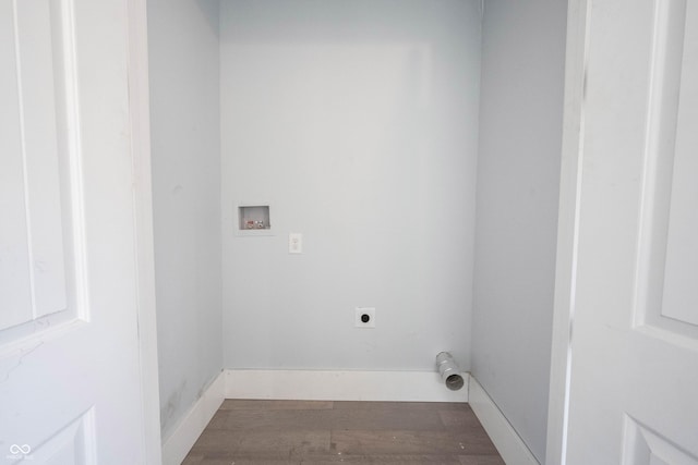 laundry area featuring electric dryer hookup, wood finished floors, laundry area, and washer hookup