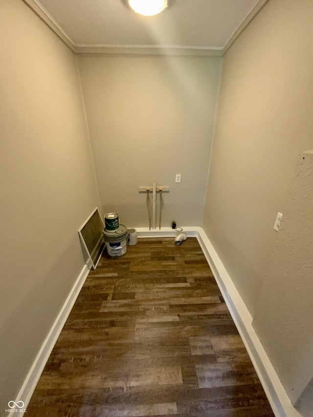 1019 E Jackson St, Shelbyville, IN 46176 - laundry area with crown molding, laundry area, dark wood finished floors, and baseboards