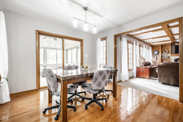 office with baseboards and light wood-type flooring
