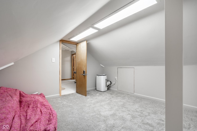 bonus room featuring carpet floors, baseboards, and lofted ceiling