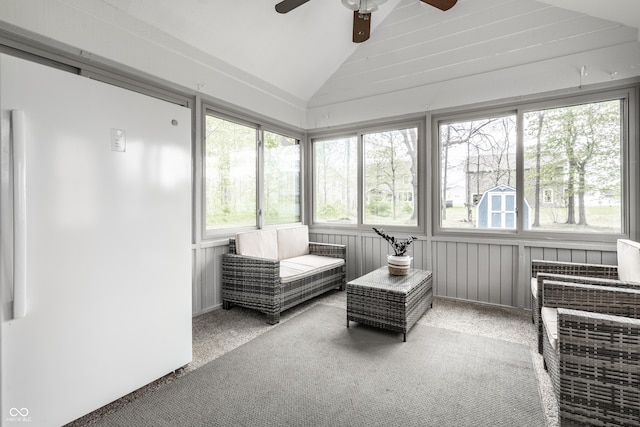 sunroom / solarium with a ceiling fan and a wealth of natural light
