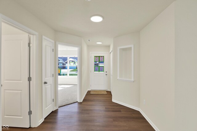 110 Maxim Ct, Cumberland, IN 46229 - corridor with baseboards and dark wood-style floors