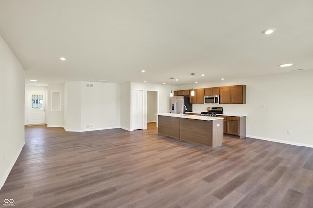 110 Maxim Ct, Cumberland, IN 46229 - kitchen with recessed lighting, open floor plan, appliances with stainless steel finishes, and dark wood-type flooring