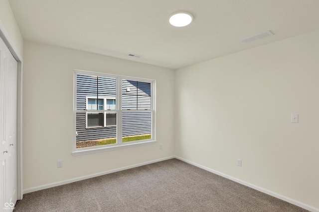 110 Maxim Ct, Cumberland, IN 46229 - empty room featuring carpet flooring, baseboards, and visible vents