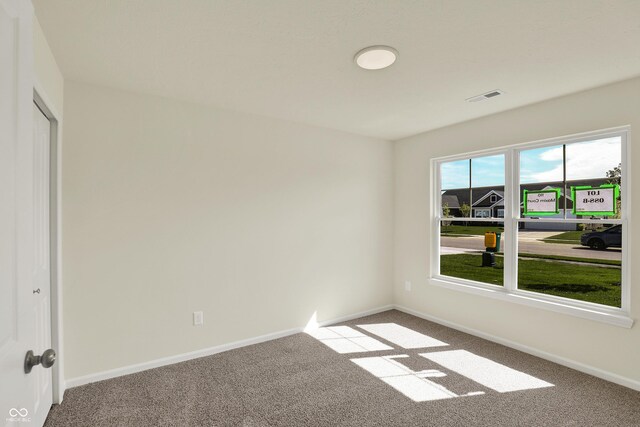110 Maxim Ct, Cumberland, IN 46229 - carpeted spare room featuring baseboards and visible vents