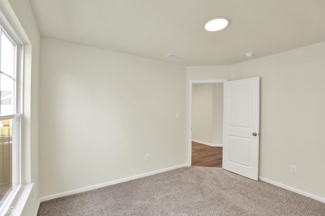 110 Maxim Ct, Cumberland, IN 46229 - carpeted spare room with baseboards