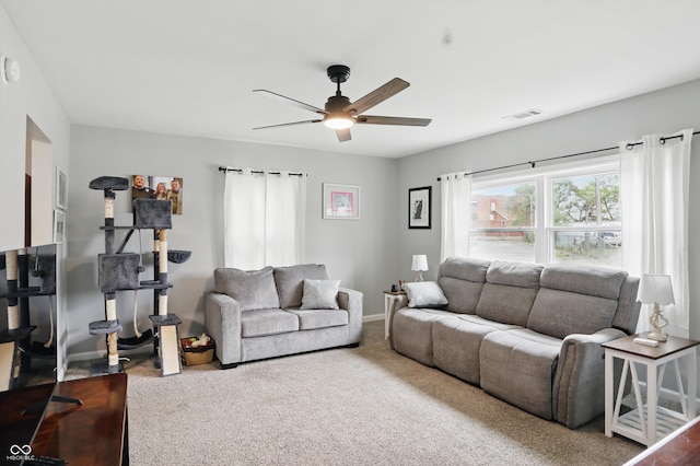 842 Miller Ave, Shelbyville, IN 46176 - living area featuring a ceiling fan, baseboards, visible vents, and carpet