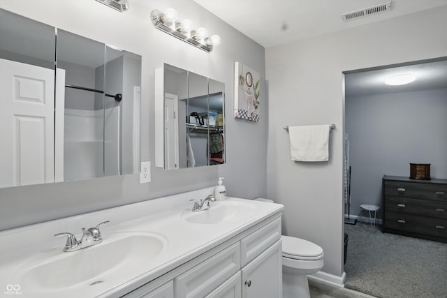 842 Miller Ave, Shelbyville, IN 46176 - full bathroom with a sink, toilet, double vanity, and visible vents