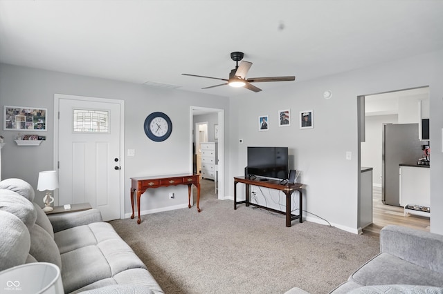 842 Miller Ave, Shelbyville, IN 46176 - living room with baseboards, ceiling fan, visible vents, and light colored carpet