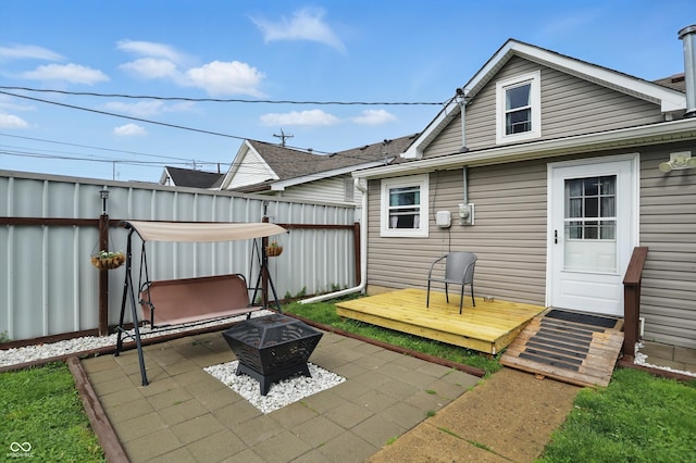 842 Miller Ave, Shelbyville, IN 46176 - view of patio with fence, a wooden deck, and an outdoor fire pit