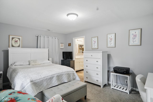 842 Miller Ave, Shelbyville, IN 46176 - bedroom featuring visible vents, ensuite bath, and light carpet