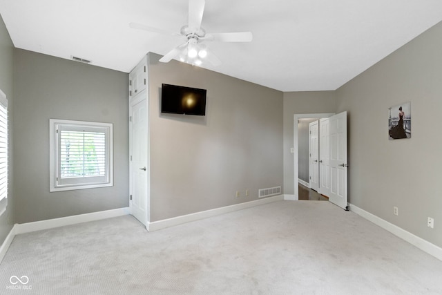 10919 Running Tide Ct, Indianapolis, IN 46236 - unfurnished bedroom featuring carpet, baseboards, and a ceiling fan