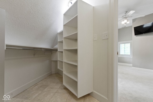 10919 Running Tide Ct, Indianapolis, IN 46236 - walk in closet featuring ceiling fan