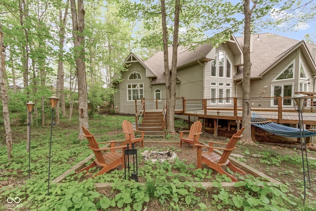 10919 Running Tide Ct, Indianapolis, IN 46236 - rear view of property with a fire pit, roof with shingles, a deck, and stairs